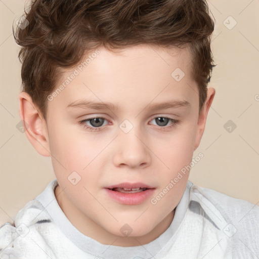 Joyful white child male with short  brown hair and brown eyes