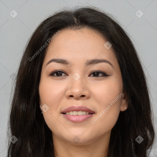 Joyful asian young-adult female with long  brown hair and brown eyes