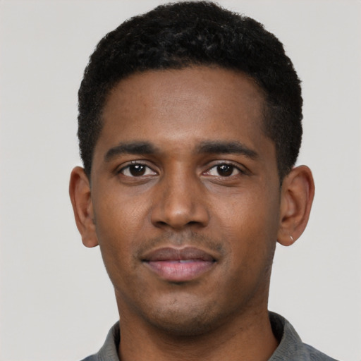 Neutral black young-adult male with short  black hair and brown eyes