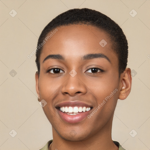 Joyful latino young-adult female with short  black hair and brown eyes