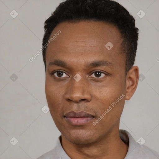 Neutral black young-adult male with short  black hair and brown eyes