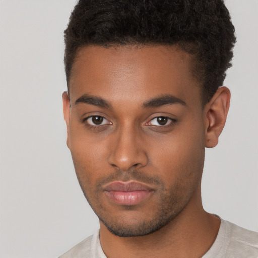 Neutral black young-adult male with short  brown hair and brown eyes