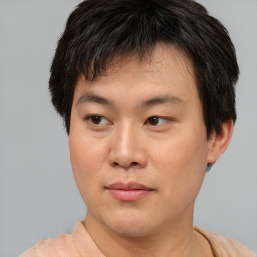 Neutral asian young-adult male with short  brown hair and brown eyes