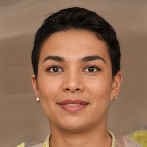 Joyful latino young-adult female with short  brown hair and brown eyes