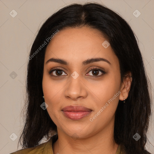 Joyful latino young-adult female with long  black hair and brown eyes