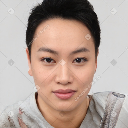 Joyful asian young-adult female with short  brown hair and brown eyes