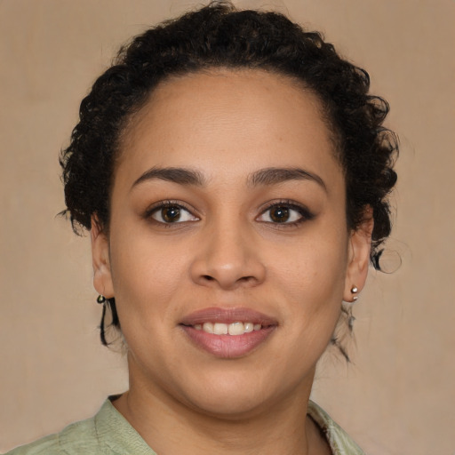 Joyful latino young-adult female with short  brown hair and brown eyes