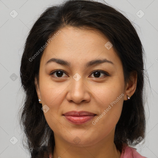 Joyful latino young-adult female with medium  brown hair and brown eyes