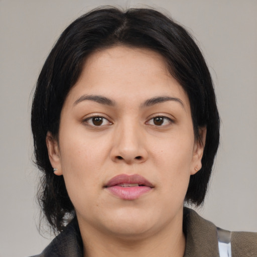 Neutral asian young-adult female with medium  brown hair and brown eyes