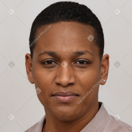 Joyful black young-adult female with short  black hair and brown eyes