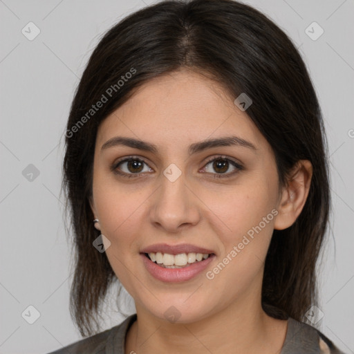 Joyful white young-adult female with medium  brown hair and brown eyes