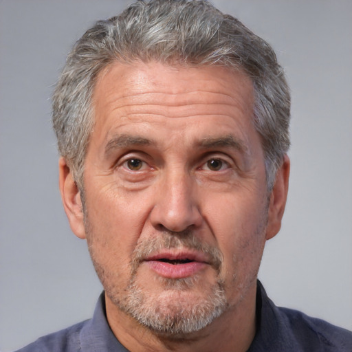 Neutral white middle-aged male with short  gray hair and brown eyes