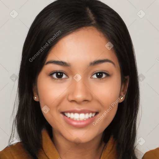 Joyful latino young-adult female with long  brown hair and brown eyes