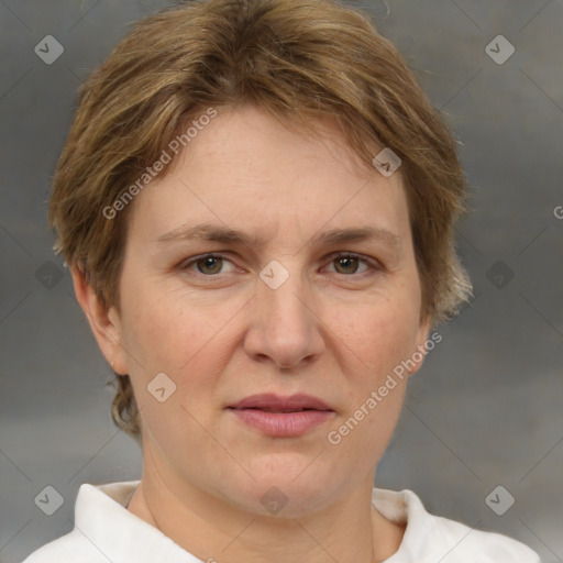 Joyful white adult female with short  brown hair and brown eyes