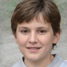 Joyful white child female with short  brown hair and brown eyes