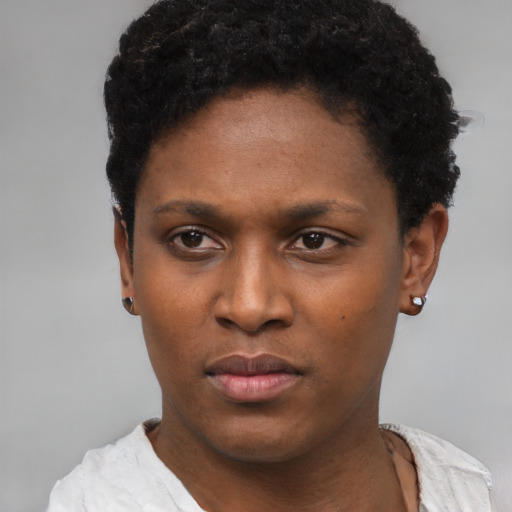Neutral black young-adult female with short  black hair and brown eyes