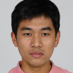 Neutral asian young-adult male with short  brown hair and brown eyes