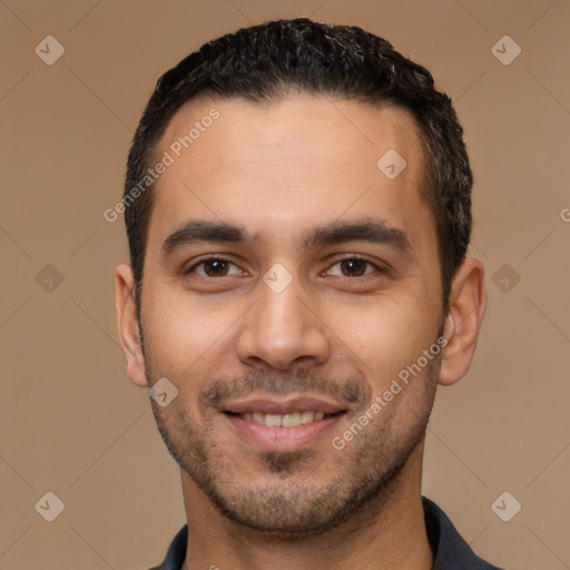 Joyful white young-adult male with short  black hair and brown eyes