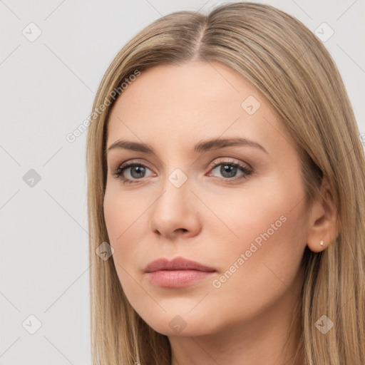 Neutral white young-adult female with long  brown hair and brown eyes