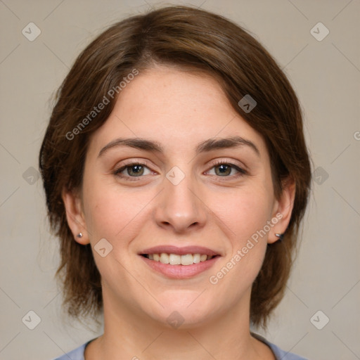 Joyful white young-adult female with medium  brown hair and grey eyes