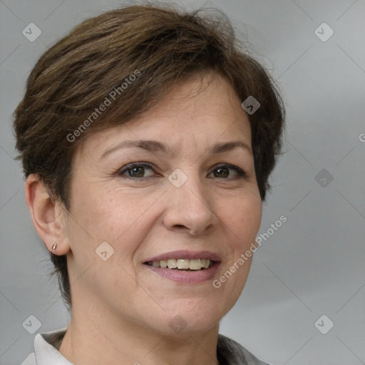 Joyful white adult female with medium  brown hair and brown eyes