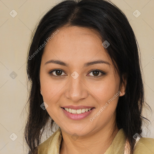 Joyful latino young-adult female with long  brown hair and brown eyes