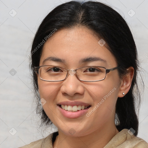 Joyful white adult female with medium  brown hair and brown eyes