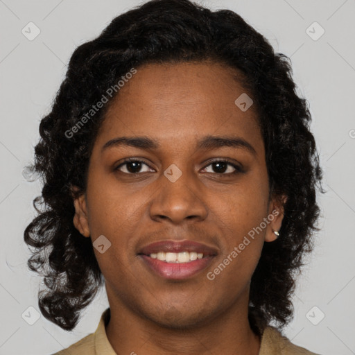 Joyful black young-adult female with medium  brown hair and brown eyes