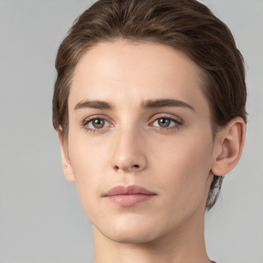 Neutral white young-adult female with medium  brown hair and brown eyes