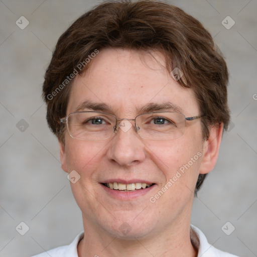 Joyful white adult male with short  brown hair and grey eyes