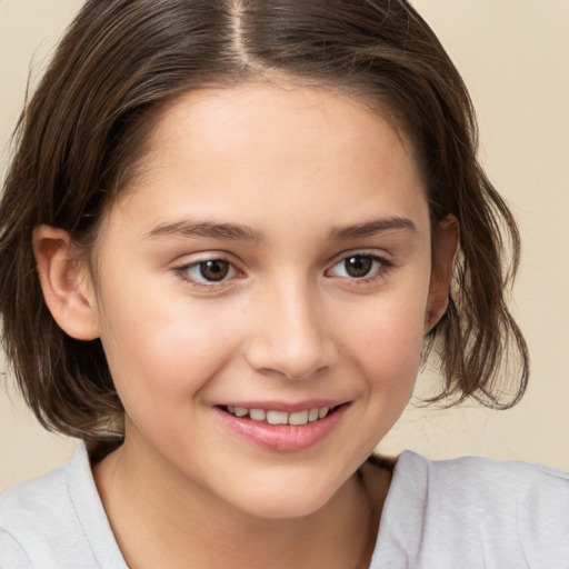 Joyful white child female with medium  brown hair and brown eyes