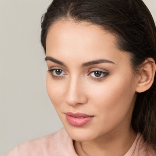 Neutral white young-adult female with medium  brown hair and brown eyes