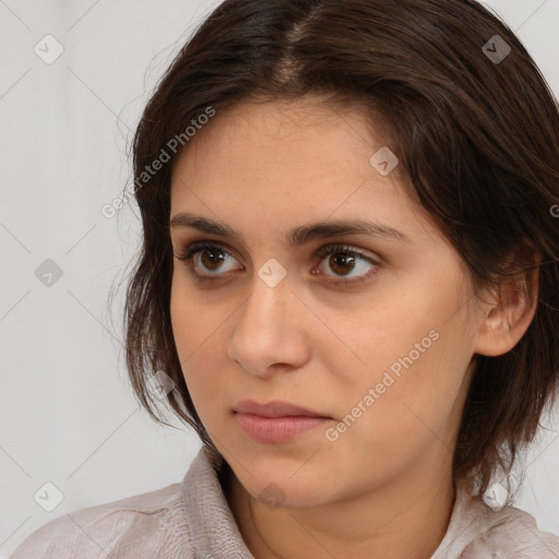 Neutral white young-adult female with medium  brown hair and brown eyes