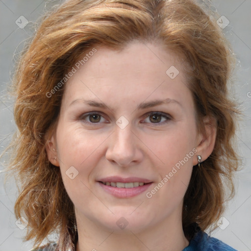 Joyful white young-adult female with medium  brown hair and blue eyes