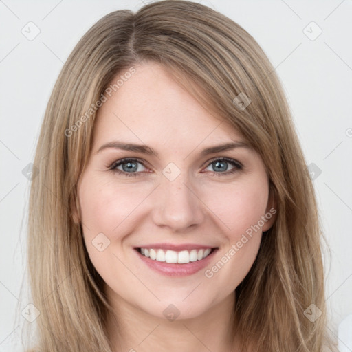 Joyful white young-adult female with long  brown hair and grey eyes