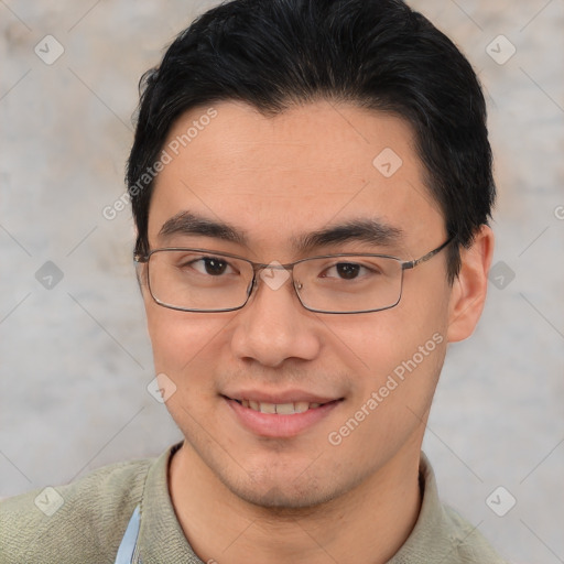 Joyful asian young-adult male with short  brown hair and brown eyes