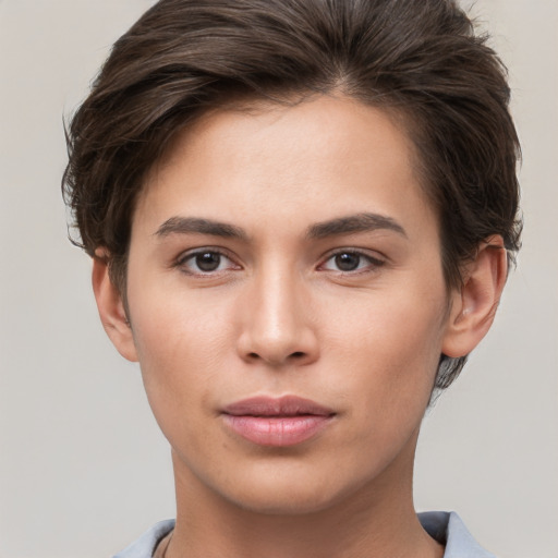 Neutral white young-adult female with short  brown hair and brown eyes