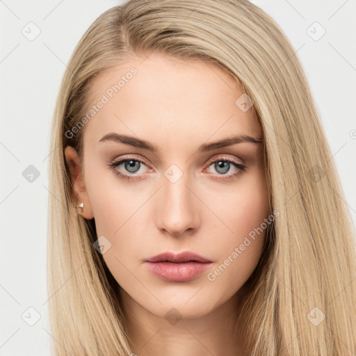 Neutral white young-adult female with long  brown hair and brown eyes