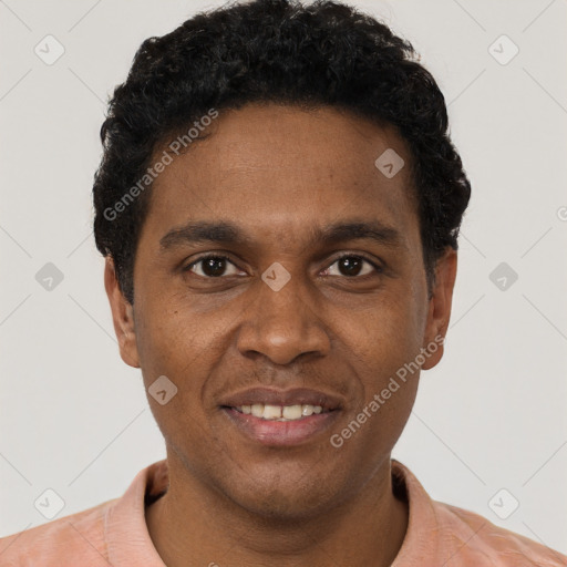 Joyful black young-adult male with short  black hair and brown eyes