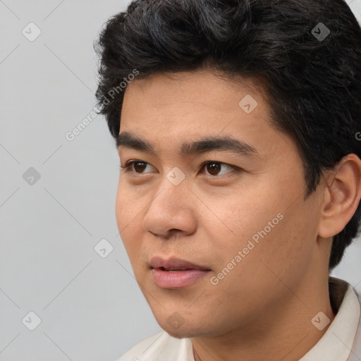 Neutral white young-adult male with short  black hair and brown eyes