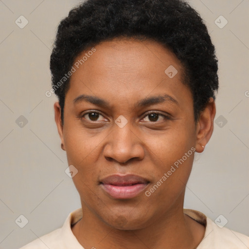 Joyful black young-adult female with short  black hair and brown eyes