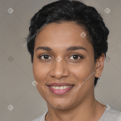 Joyful latino young-adult female with short  black hair and brown eyes