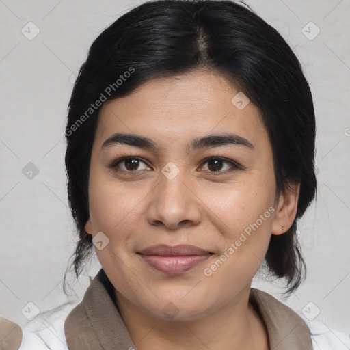 Joyful asian young-adult female with medium  black hair and brown eyes