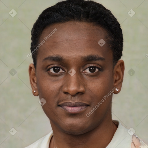 Joyful black young-adult male with short  black hair and brown eyes