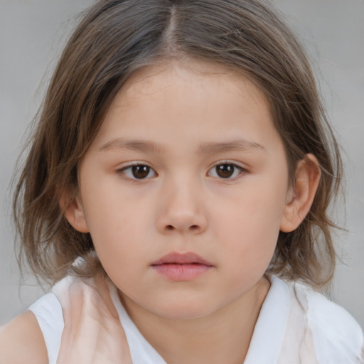 Neutral white child female with medium  brown hair and brown eyes