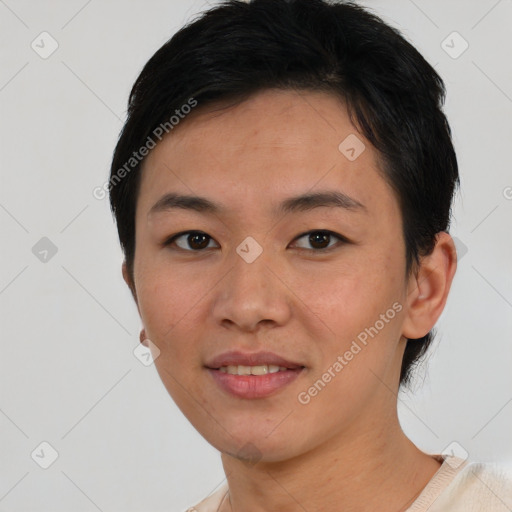 Joyful asian young-adult female with short  black hair and brown eyes