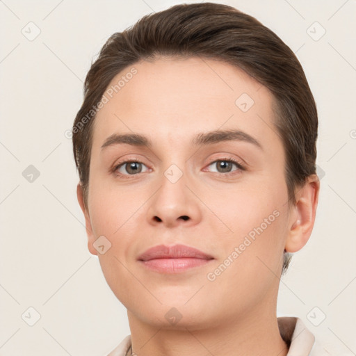 Neutral white young-adult female with short  brown hair and brown eyes