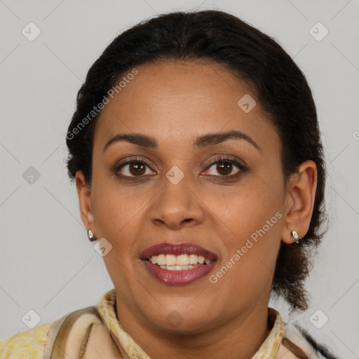 Joyful latino young-adult female with medium  brown hair and brown eyes