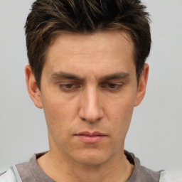 Neutral white adult male with short  brown hair and brown eyes