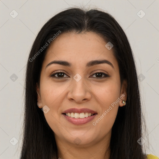 Joyful latino young-adult female with long  brown hair and brown eyes